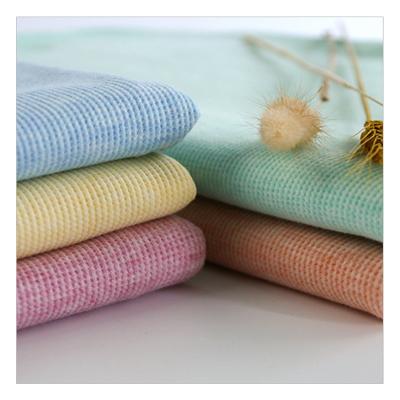 China Abrasion-Resistant Green Natural Yarn Dyed Fabric Knitted Ribbed Colored 180gsm Cotton Fabric For Shirts for sale