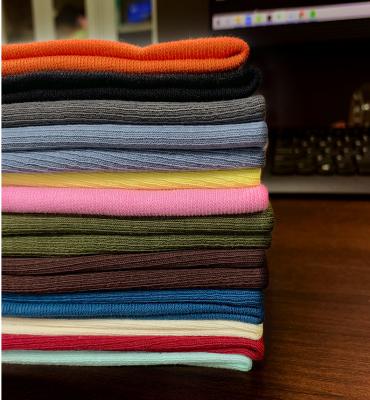 China Anti Pill Fabric Fashion Knitted Interlock Plain Dyed Polyester 280gsm Cotton Spandex Fabric For Dress for sale