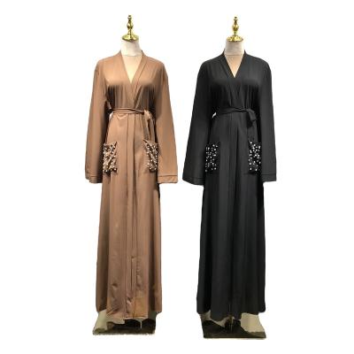 China Modest Muslimah Styling Dubai Muslim Solid Kimono Cardigan Abaya Robe Long Robe With Pearl Pocket for sale