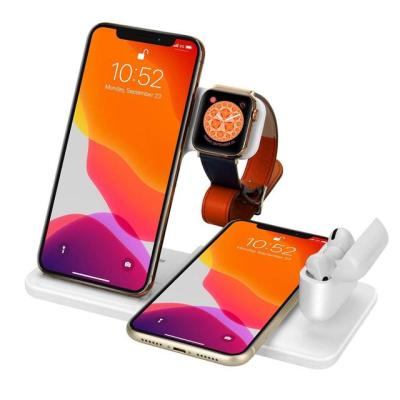 China Mobile Phone 2022 Quickly 4 in 1 Magnet Charger Wireless Stand Phone Earphone Smartwatch Wireless Charging Station for sale