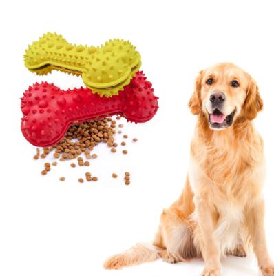 China New Design Sustainable Dog Chew Toys Rubber Food Feeder Dog Bone Shape Dispenser Toy for sale