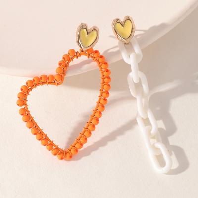 China FASHIONABLE Asymmetric Geometric Heart Earrings Love Painting Alloy Oil Drip Arylic Drop Chain Earrings for sale