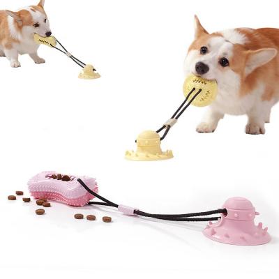 China New Stocked Pet Chew Toy High Quality Tpr Food Leakage Dog Teeth Remover Toy Dog Chew Toy With Sucker for sale