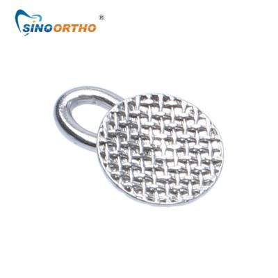 China SINO ORTHO- Metal Orthodontic Lingual Button with Eyelet Weldable Bondable for sale