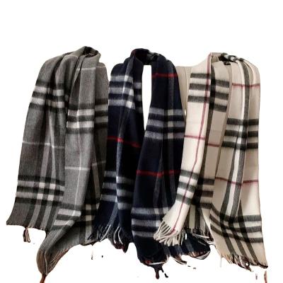 China Low MOQ wholesale high quality soft luxury thick shawl knitted winter poncho keep warm silk scarves cut out other scarves for sale