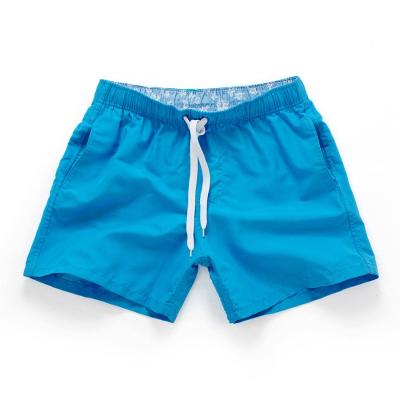 China AIMPACT Polyester Breathable Custom Seaside Beach Swim Shorts Surfing Board Shorts for sale