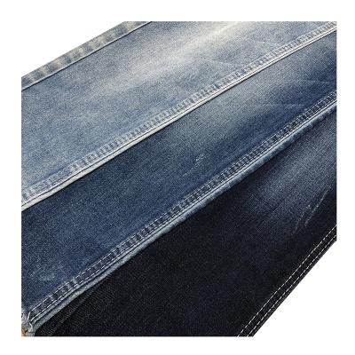 China Shrink-Resistant 8.9Oz Dk Indigo Mid Stretch Adn Girls Leftover Stock Stretch Jeans Denim Fabric Materials for sale