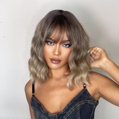 China Long Synthetic Wig Ready To Wear Daily Natural Hair Wigs Short Honey Brown Water Wave Synthetic Wigs With Bangs for sale