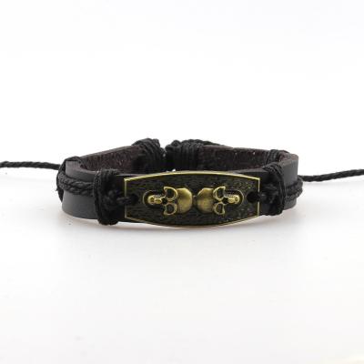 China Alloy Bracelet Vintage Skull Punk Leather Punk Rock Tie Bracelet Multilayer Knitting Bracelet For Men for sale