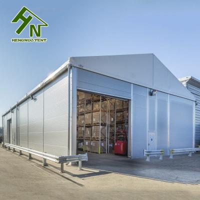 China UV Resistance Temporary Logistics Warehouse Tent / Waterproof / Fireproof Aluminum Frame Sandwich Panel Wall for sale