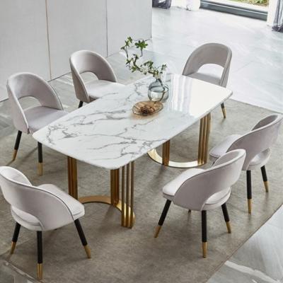 China Modern Luxury Gold Steel Marble Dining Table Set Modern Dining Room Furniture 6 Seater for sale