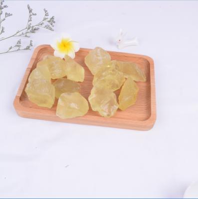 China China Wholesale Yellow Crystal Stone Aromatherapy Stone Crafts Rough Grinding Crystal Ornaments for sale