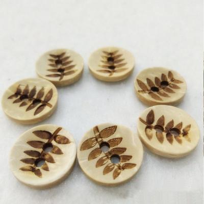 China Sustainable Coconut Shell Buttons 13mm Flower Button Natural Brown Leaves Pattern Plant Wood Button for sale