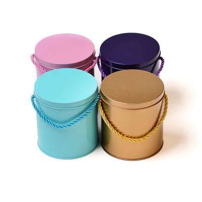 China Modern luxury round tin box with handle custom logo bigpcakging round tin box for sale