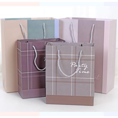 China Wholesale Recyclable Colorful Paper Paper Bags Storage Shopping Bags With Your Own Logo Luxury Paper Suitcase for sale