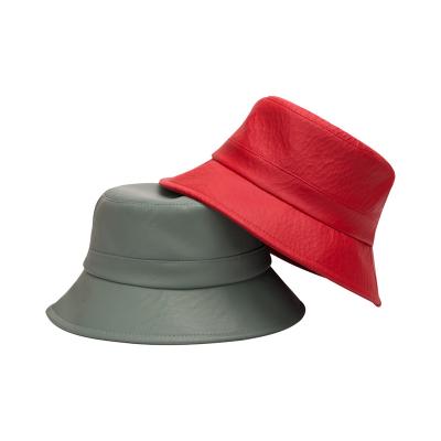 China To keep warm Unisexual winter patent leather embossed fisherman's hat PU hat outdoor thermal bucket hat for sale