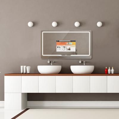 China Minimalist Modern Bathroom Wall Mounted Smart Led Mirror With Time Display for sale