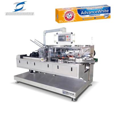 China Food Mechanism Automatic Horizontal Intermittent Toothpaste Tube With Leaflet Box Cartoning Machine for sale