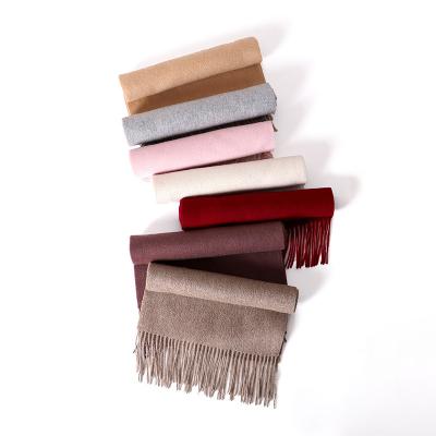 China Wool best selling factory direct autumn and winter couples new thick warm monochrome 100% wool with tassel fashion scarf shawl for sale