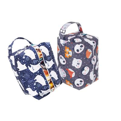 China Water Resistant Mora Mona 2 Layers Diaper Pod Cloth Waterproof Wet Bags Diaper Bag 27*17*17cm Washable for sale