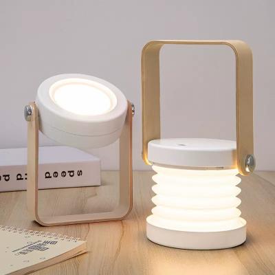 China Modern Creative Rechargeable 360 Rotatable Collapsable Portable Bedside Folding Led Night Light Wooden Table Desk Lamp For Camping for sale