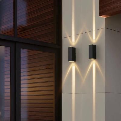 China Polycarbonate 2W 4W 6W 8W Light up and Down Luminous Minimalist Outdoor Indoor Lighting Fixture Waterproof Garden Wall Light LED Wall Lamp for sale