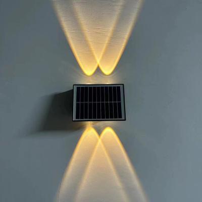 China Polycarbonate Solar Lights Outdoor Garden Dual Color Brightness Mode LED Wall Light for Decoration for sale