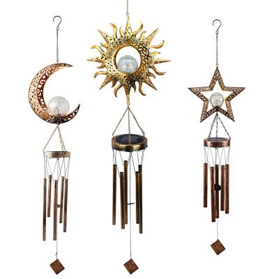 China Modern Solar Garden Moon Lamp Sun and Moon Wind Chime Pendant Iron Hollow Outdoor Garden Landscape Decorative Lamp Light for sale