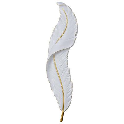 China Modern high quality home hotel villa project decorative resin creative modern feather design indoor led wall lamps for sale