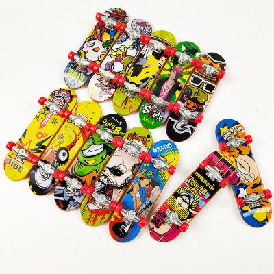 China Playing New creative alloy plastic desktop toys mini custom finger skateboard for children for sale