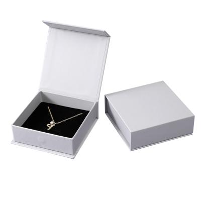 China Recyclable Custom Logo Printed Premium White Paper Cardboard Magnetic Jewelry Box for sale