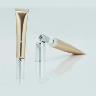 China 20g Cosmetic Empty Eye Cream Tube Luxury Custom Packaging With Single Roller Massager Applicator for sale