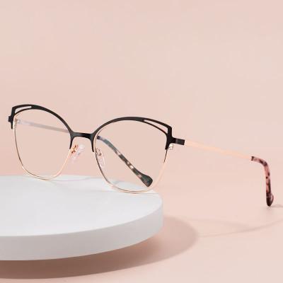 China Fashion Trendy Women's Anti-blue Glass Cateye Glasses With Metal Spring Temples Optical Frames for sale