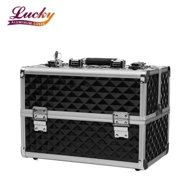 China Large Storage Capacity Durable Professional Makeup Case Train Box With Four Removable Trays Dividers for sale