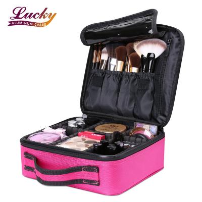 China Portable Large Capacity Women Makeup Train Case Makeup Bag Organizer with Adjustable Dividers for Makeup Brushes for sale