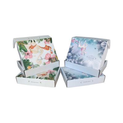 China Recycled Packaging Materials 24*16*6cm Foldable Flat Packing Materials Airplane Box Plain Cardboard Shipping Box for sale