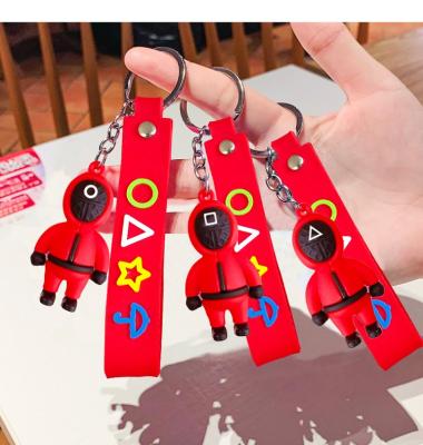 China Promotion & OEM Logo Keychain Squid Game Car Gift KBS002 Cute Red Squid Man Cosplay Key Gift Wholesale Silicone Cartoon 3D Pendant for sale