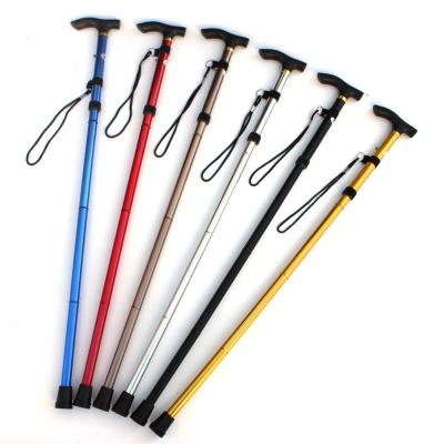 China EVA Four-section Folding Handle Elderly Walking Stick For Mountaineering Portable Aluminum Alloy T-shaped Stick for sale