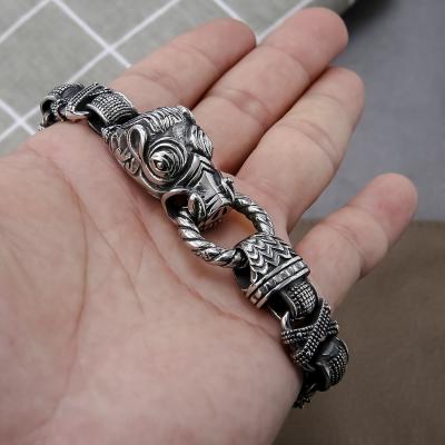 China Punk Men's Animal Head Titanium Steel Totem Casting Stainless Steel Bracelet Locking Silver for sale