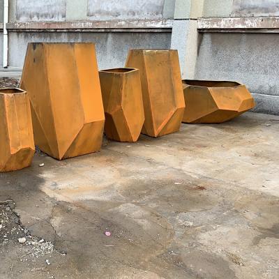 China Irregular Shape Weathering Steel Flower Pot | Durable Outdoor Planters for sale