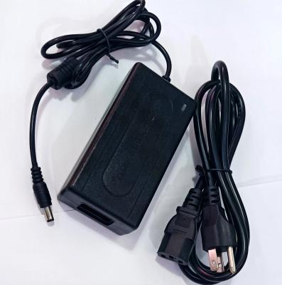 China Monitoreo LCD cámaras de circuito cerrado C-alimentador 4 puertos Cable DC dividido 12V DC 5A 60W Adaptador AC DC en venta