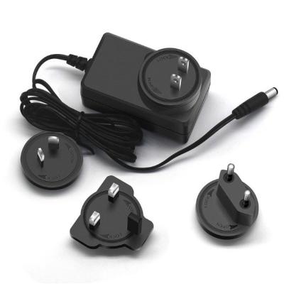 China DC Output Type Black C-Power 12V 2A Power Adapter with EU AU UK US Plug 100-240V for sale