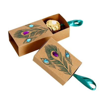 China Handmade Custom Peacock Feather Boxes Drawer Design Wedding Favors Wrapping Paper Gift Boxes for sale