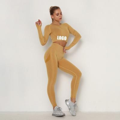 China Breathable Custom Logo Letter Women High Waist Hip Lift Sports Leggings Fitness Wear Seamless Long Sleeve Yoga Set for sale