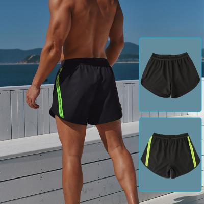 China Wholesale QUICK DRY Gym Short Cross Fitted Mens Shorts Fitness Workout Shorts Mens Sports Running Mens Trunks for sale