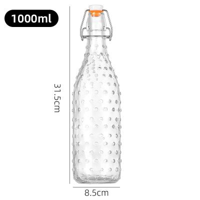 China Botellas de leche de vidrio transparente de 1000 ml Lavavajillas seguras reutilizables a prueba de fugas en venta