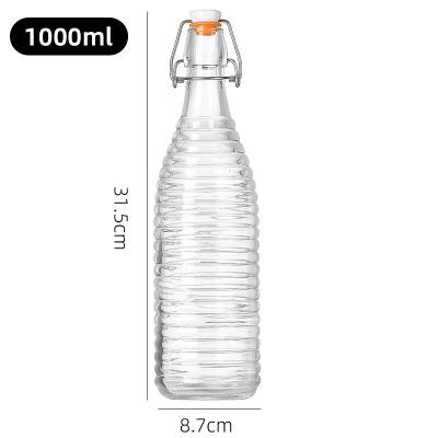 China 1000ML Swing Top Glass Bottles Clear Bottle with Airtight Caps for Water Beer Juice for sale