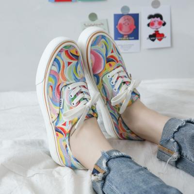 China fashion trend sh11659a summer print canvas shoes men rainbow colorful graffiti men vulcanized casual shoes canvas sneakers for sale