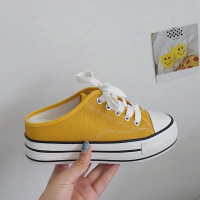 China fashion trend sh11469a half spring slippers sneakers women yellow unique korean thick canvas shoes platform shoes for sale