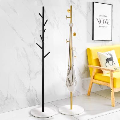 China Vintage Floor Standing Nordic Art Tree Coat Hat Rack Gold Iron Garment Shelf With Round Marblefor Living Room Bedroom for sale